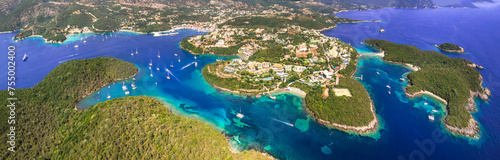 Sivota - stunning aerial drone video of turquoise sea known as Blue Lagoon and white sandy beaches. Epirus, Greece summer holidays