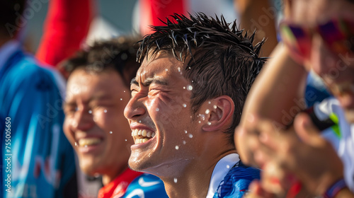Athletes in sheer joy celebrate a victorious moment, with splashes of water adding to the dynamic and jubilant atmosphere of the sporting event.