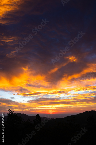 Beautiful Colorful Cloudy Sunrise Over Mountains in Boulder, Colorado