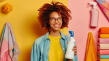 An environmentally-conscious woman with glasses holds a laundry detergent bottle