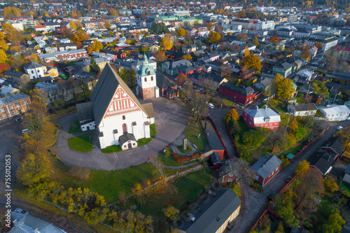 Old Lutheran Cathedral in the cityscape on a sunny October day (shooting from a quadcopter). Porvoo, Finland