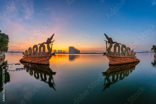 West Lake Dragons statue in Hanoi in early morning photo