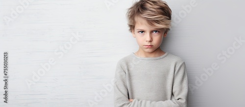 Young Boy with a Startled Expression in a Surprising Moment of Discovery photo