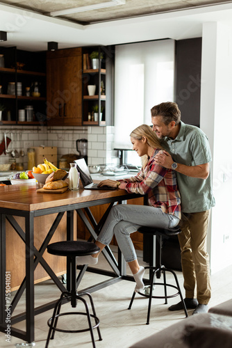 Cheerful couple enjoys a li...