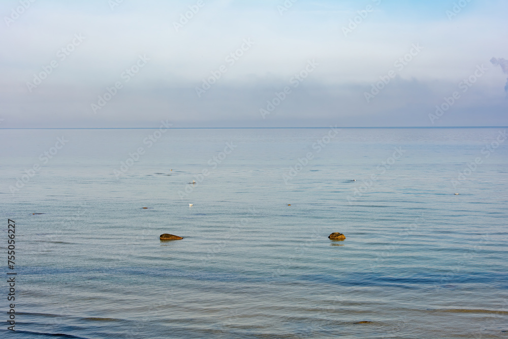 Stones in the sea in calm water
