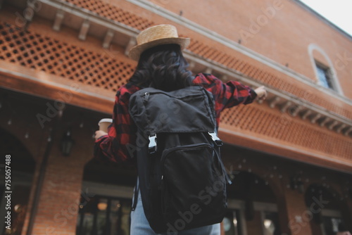 Woman travel around the world with backpack freedom and relax life concept.