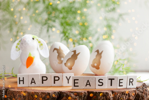 Happy Easter decoration White cute banny and Easter eggs photo
