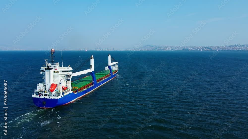 Bulk dry cargo carrier ship for carrying cargo cruising across the sea, Aerial Bulk dry cargo carrier ship for carrying cargo cruising across the sea, Aerial