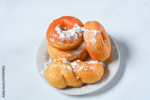 Close up of original donuts without toppings on a white background. Isolated objects