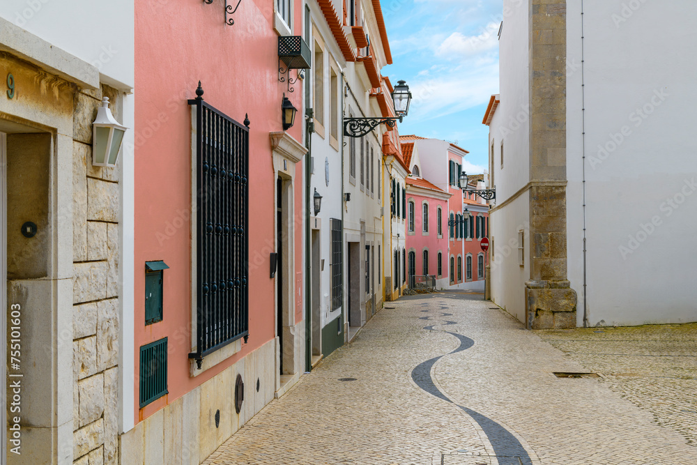 Traditional Portuguese pavement calçada à Portuguesa in the colorful ...