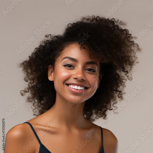 Beautiful smiling African American woman with smooth healthy skin portrait isolated background 