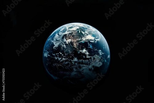 The Earth, our planet, shines brightly against the dark void of space.