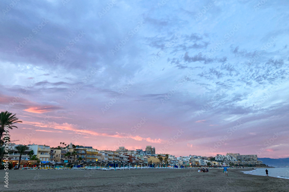 Sunset on Costa del Sol beach, Malaga, Spain