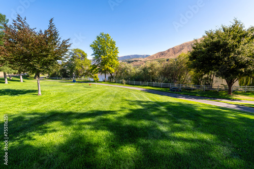 The scenic waterfront Kirby Billingsley Hydro Park along the Columbia River as it runs through East Wenatchee on Highway 28 in Chelan County, Washington State, USA. photo