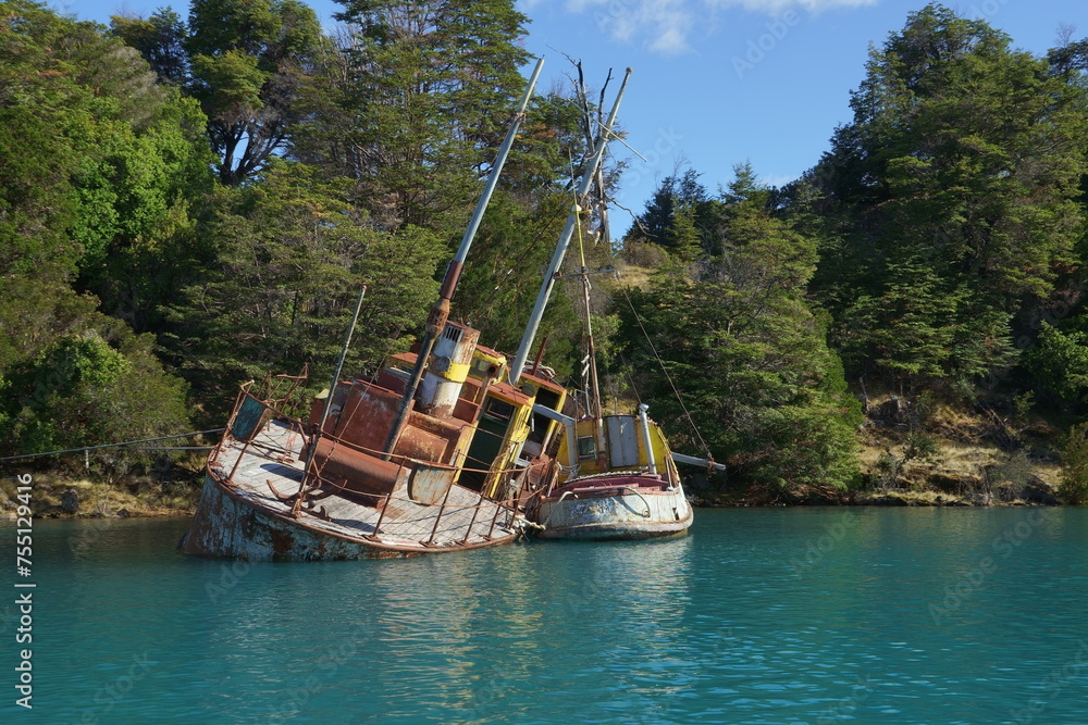 Ships wrecked in a bay Ships wrecked in a bay