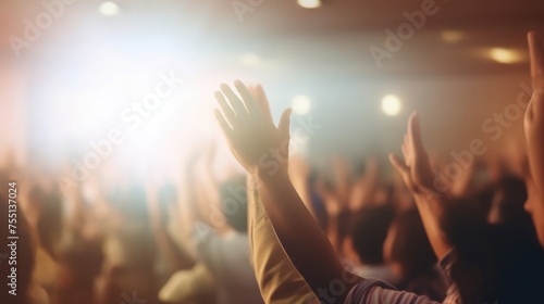 Capture the essence of spiritual devotion with a soft-focused portrayal of Christian worship, highlighting raised hands in a moment of profound reverence and prayer