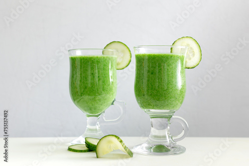 Green vegetable smoothie with fresh vegetables