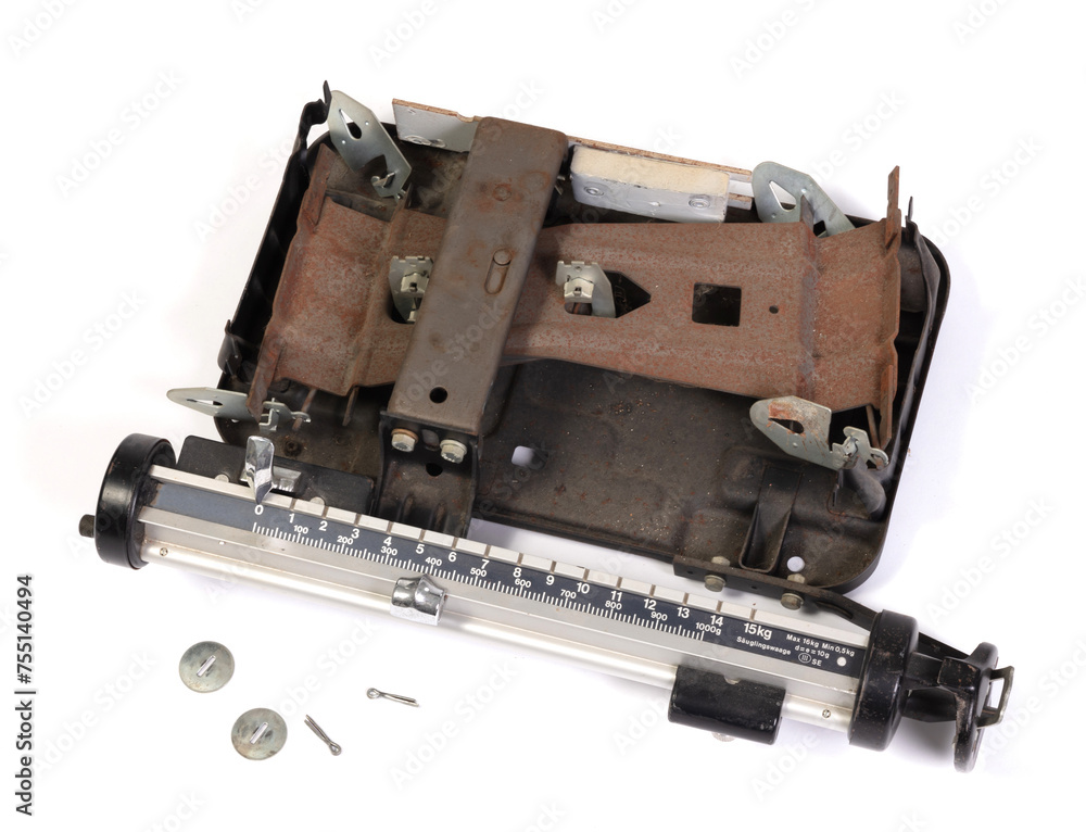Part of broken baby weight scales, isolated Part of broken baby weight scales, isolated