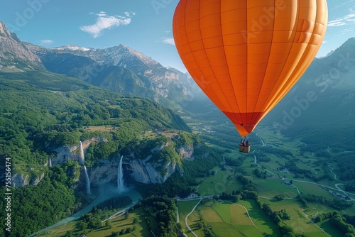 Experience the freedom of a hot air balloon journey, soaring over mountains in a vibrant landscape.