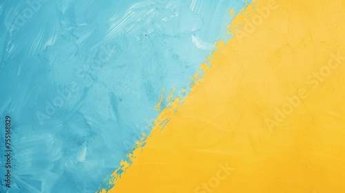 Textured abstract background with bold blue and yellow diagonal division. Contemporary art with contrasting blue and yellow textures. Diagonally split blue and yellow abstract for modern decor. photo