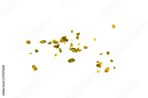 Ground, milled, crushed or granulated pistachio pile isolated on white background photo