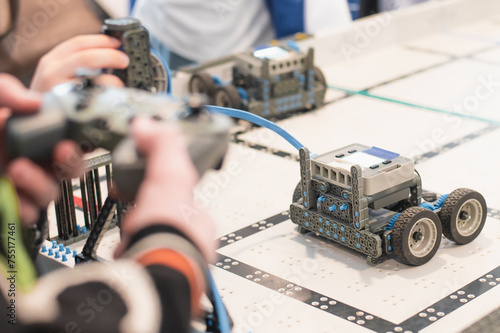 robot competitions, children control robots. High quality photo