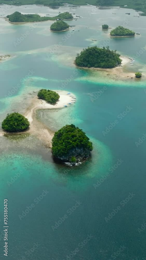 Flying above the Britania Group of Island. Surigao del Sur. Mindanao, Philippines. Vertical view. Flying above the Britania Group of Island. Surigao del Sur. Mindanao, Philippines. Vertical view.