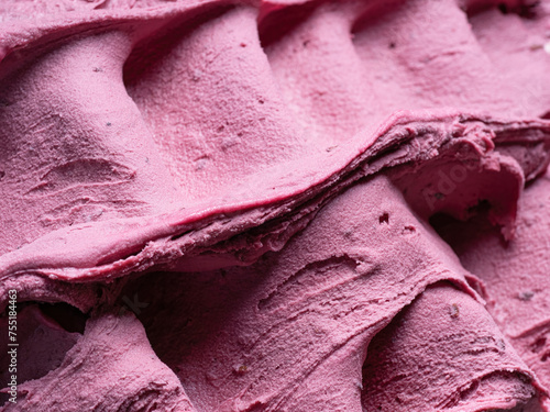 Frozen Black Elderberry flavour gelato - full frame detail. Close up of a pink surface texture of Ice cream.