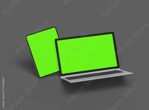 3d render of laptop and tablet with green screen on a dark background