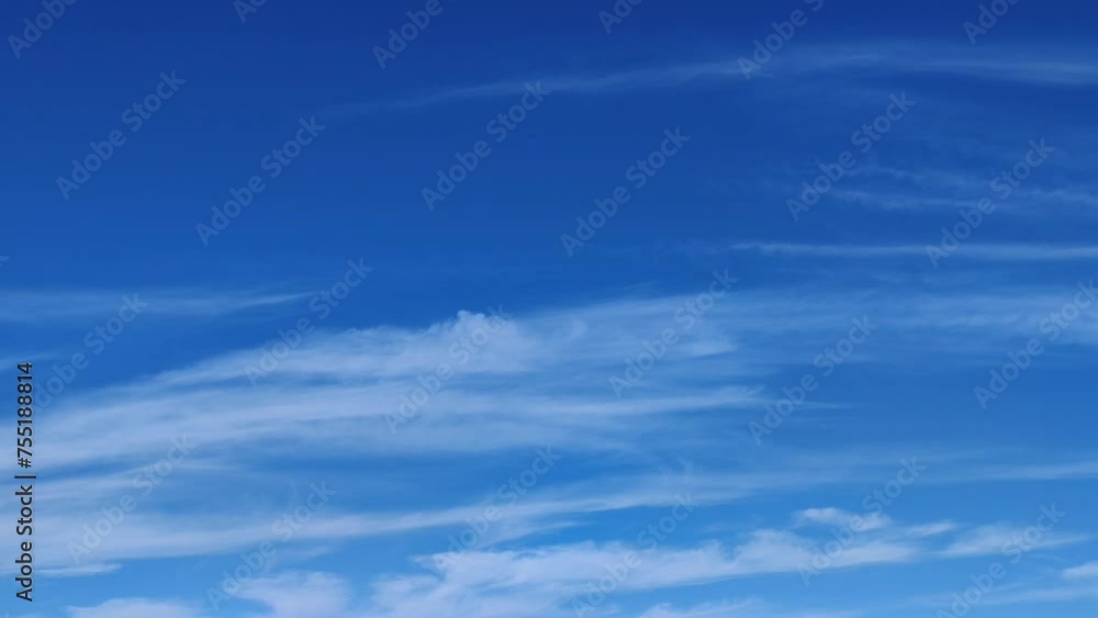 Cirrus clouds move across the blue sky in the morning Cirrus clouds move across the blue sky in the morning
