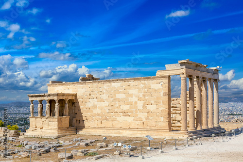 Ancient Erechtheion or Erechtheum temple with Caryatid Porch on the Acropolis, Athens, Greece. World famous landmark at the Acropolis Hill.