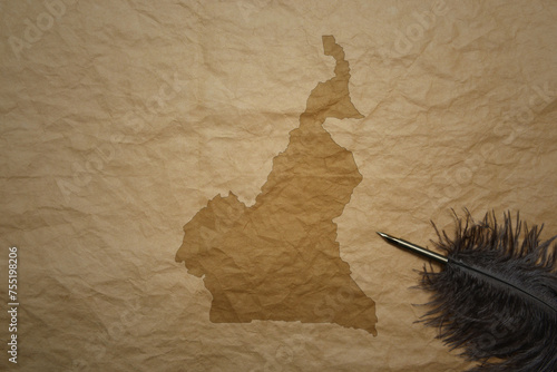 map of cameroon on a old paper background with old pen photo