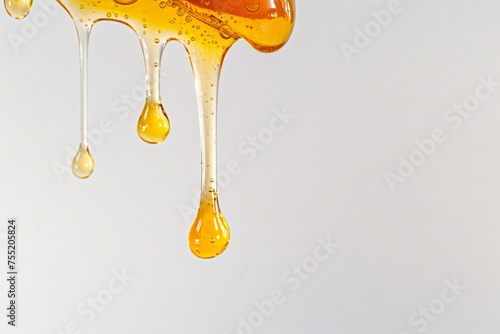 a close up of a honey dripping © moonpro