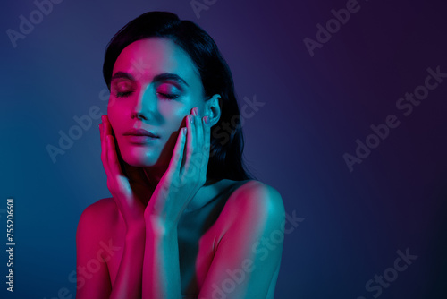 Photo of woman touch fingers cheeks enjoy close eyes isolated dark ultraviolet color background