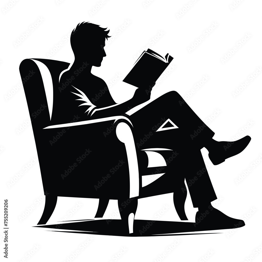 Silhouette of a Person Enjoying a Book in a Comfortable Armchair