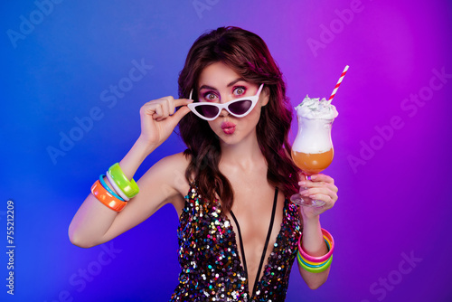 Photo portrait of pretty young girl hold cocktail amazed pouted lips kiss isolated on retro neon light background