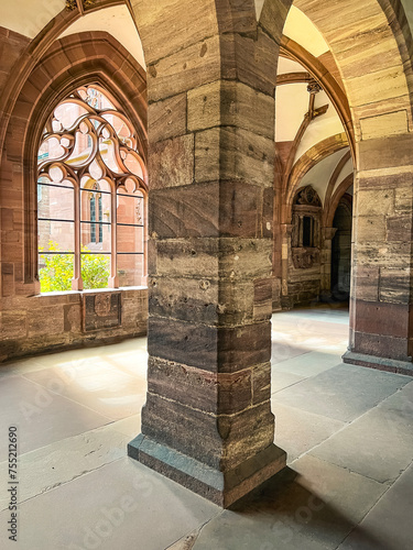 Ancient Stone Cathedral Courtyard Views. Basler Münster (Basel Minster) Cathedral in Basel, Switzerland. Built between the years 1019 and 1500 in the Romantic and Gothic styles. 