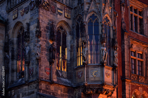 Fragment of gothic-style building exterior in Prague at evening time