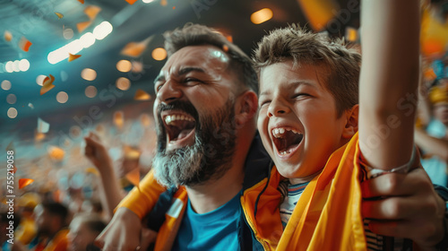  relationship and happy family concept picture of father and son cheer football match together.