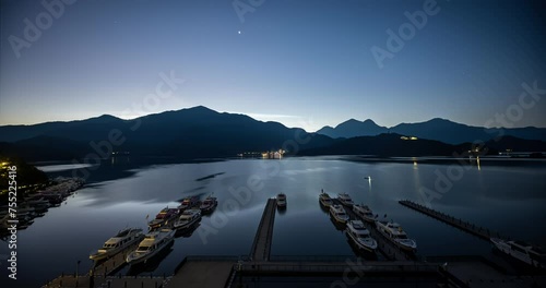 starry night to day sunrise at Sun Moon Lake Nantou Taiwan