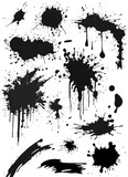 Collection of Black Ink Splatters and Abstract Symbols on White Background