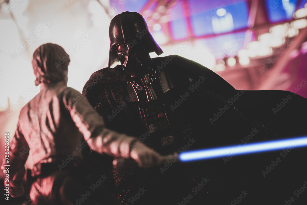 Fototapeta premium NEW YORK USA, MAR 10 2024: recreation of a scene from Star Wars The Empire Strikes Back with Jedi Luke Skywalker battling Sith lord Darth Vader in the carbonite freezing chamber on Bespin - Hasbro