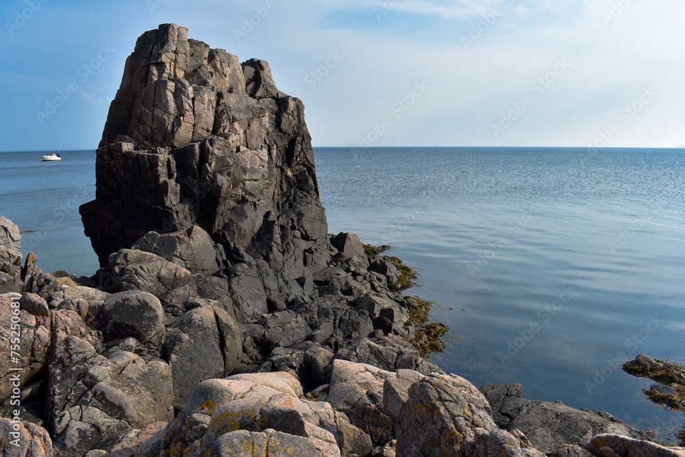 July 15, 2022 - Mölle, Sweden: Rocky beach, Landscape at Kullaberg nature reserve on the Swedish West Coast , Mölle. July 15, 2022 - Mölle, Sweden: Rocky beach, Landscape at Kullaberg nature reserve on the Swedish West Coast , Mölle.