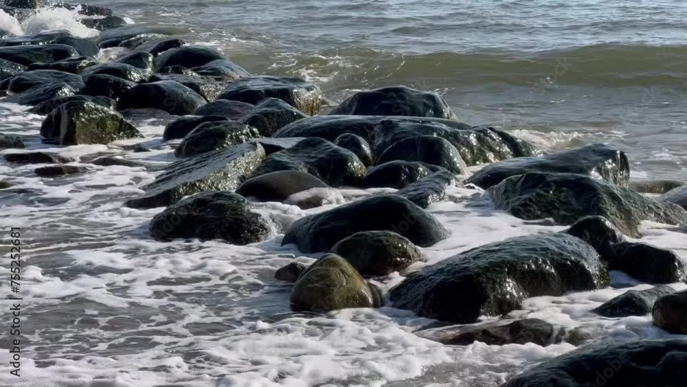 Waves break against rocks in erosion protection in Loederup, Ystad Municipality, Skane, Sweden, Baltic Sea, Scandinavia, Europe Waves break against rocks in erosion protection in Loederup, Ystad Municipality, Skane, Sweden, Baltic Sea, Scandinavia, Europe