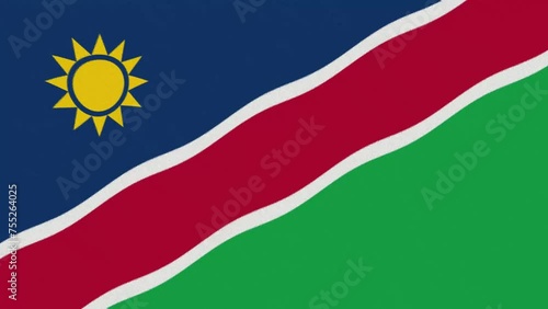 A waving flag of Namibia in 4K and 60 frames per second with artistic grain. photo