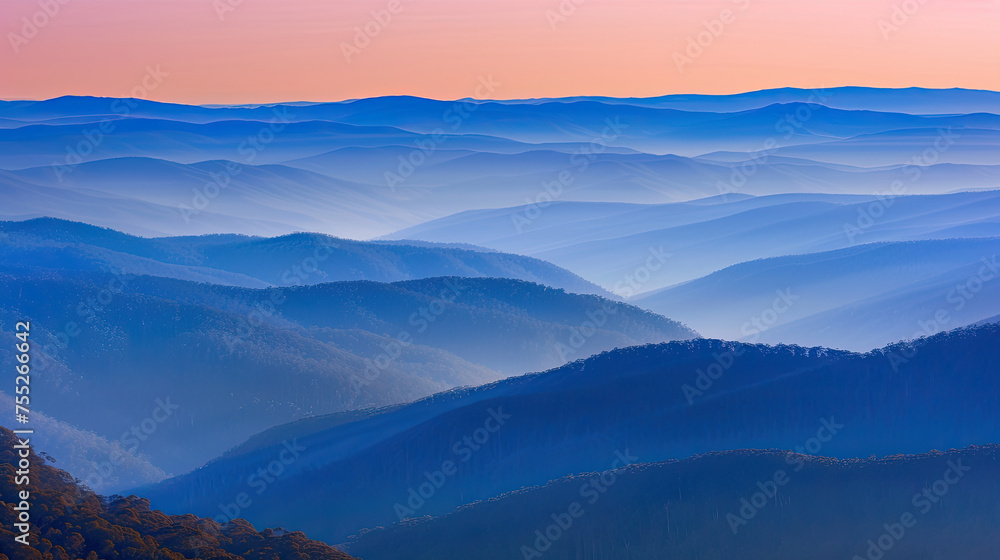 Serene landscape of rolling hills under a gradient twilight sky showcasing layers of blue and purple hues