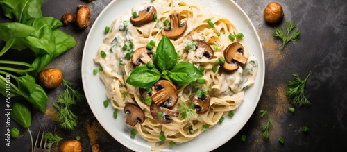 A comforting dish of pasta with mushrooms and basil, a staple food in Italian cuisine. The combination of ingredients creates a delicious and satisfying meal