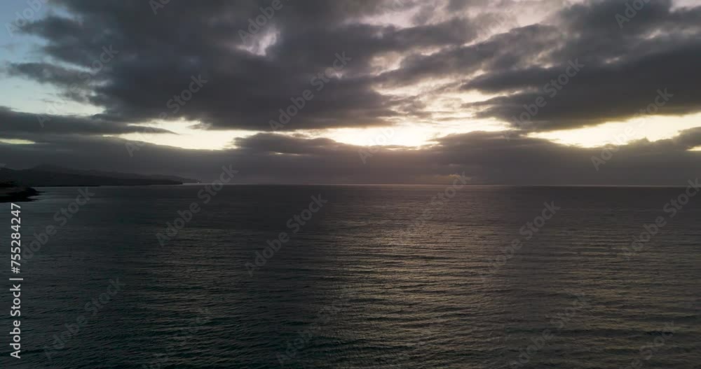 Beautiful sunset over the atlantic ocean on a cloudy day Beautiful sunset over the atlantic ocean on a cloudy day