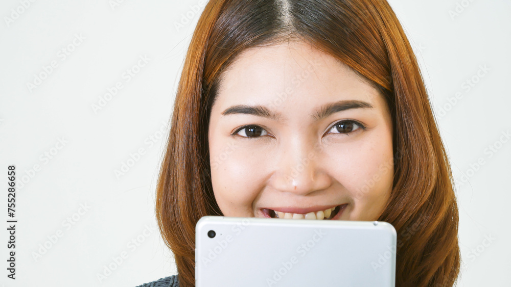 Asian woman using digital tablet shopping online, call, texting message internet technology lifestyle with smiling face. Asian woman touch smart tablet focus on hands using mobile app home office. Asian woman using digital tablet shopping online, call, texting message internet technology lifestyle with smiling face. Asian woman touch smart tablet focus on hands using mobile app home office.