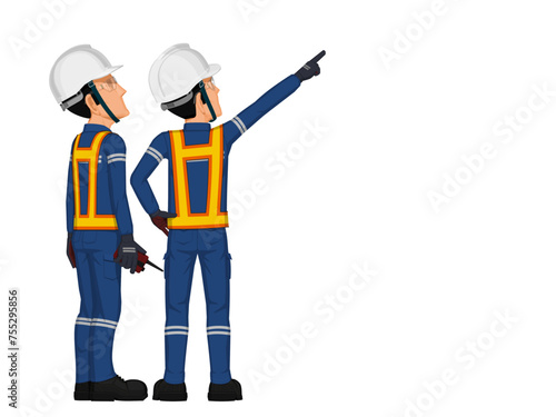 Two workers are considering something on the ceiling